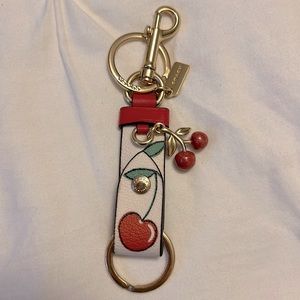 Coach trigger snap bag charm